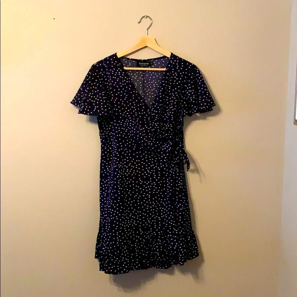 Navy and white polka dot wrap dress